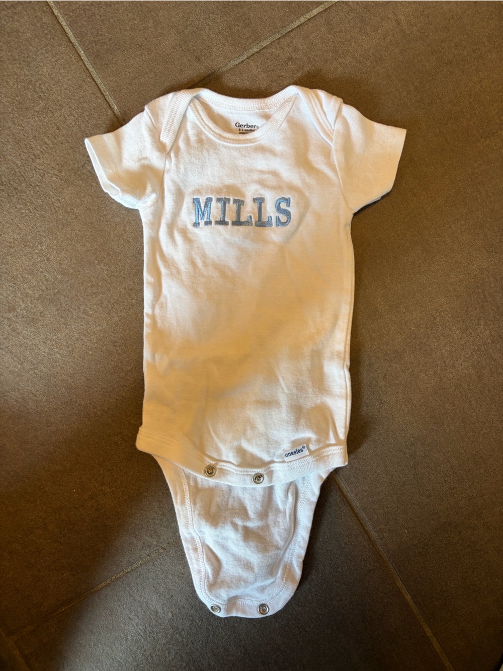 White Infant Bodysuit with 'MILLS' Blue Applique